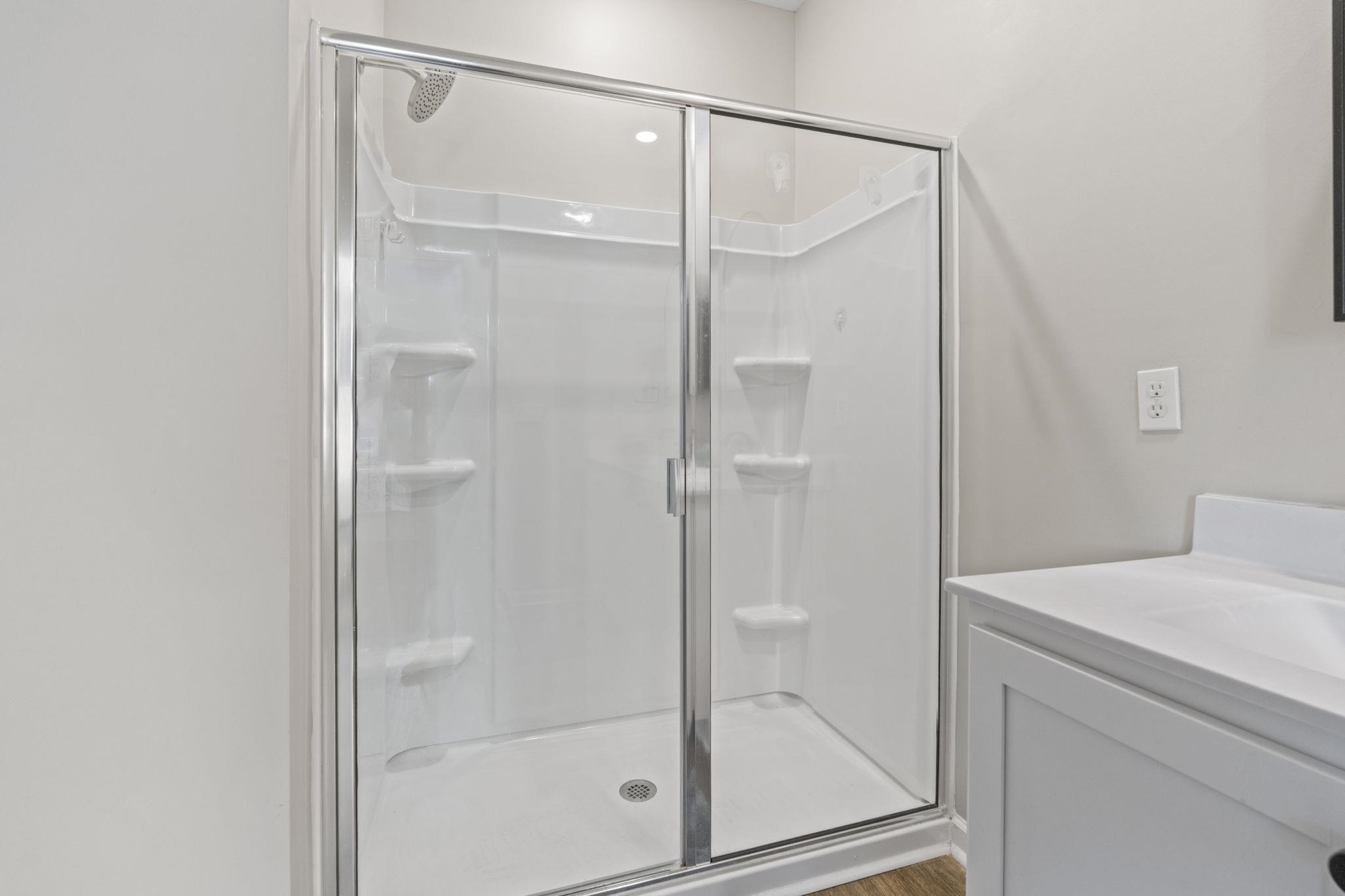 143 Ardeer Court Little River, SC 29566 - Photo 18 of 40 Bathroom with vanity and a shower stall