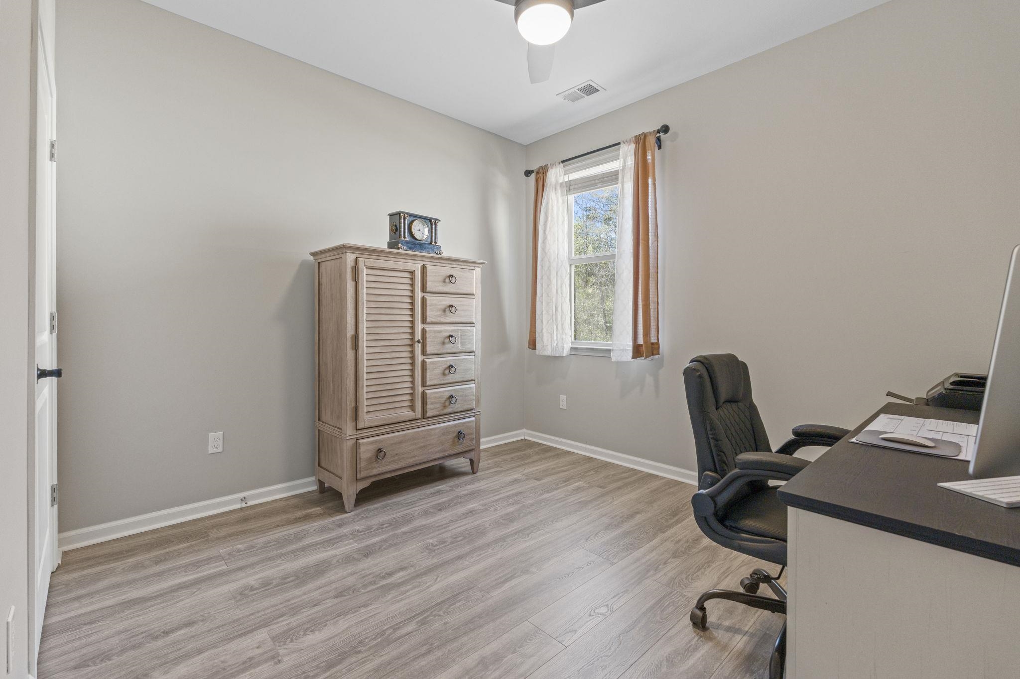 143 Ardeer Court Little River, SC 29566 - Photo 25 of 40 Home office with light wood-type flooring and a ceiling fan