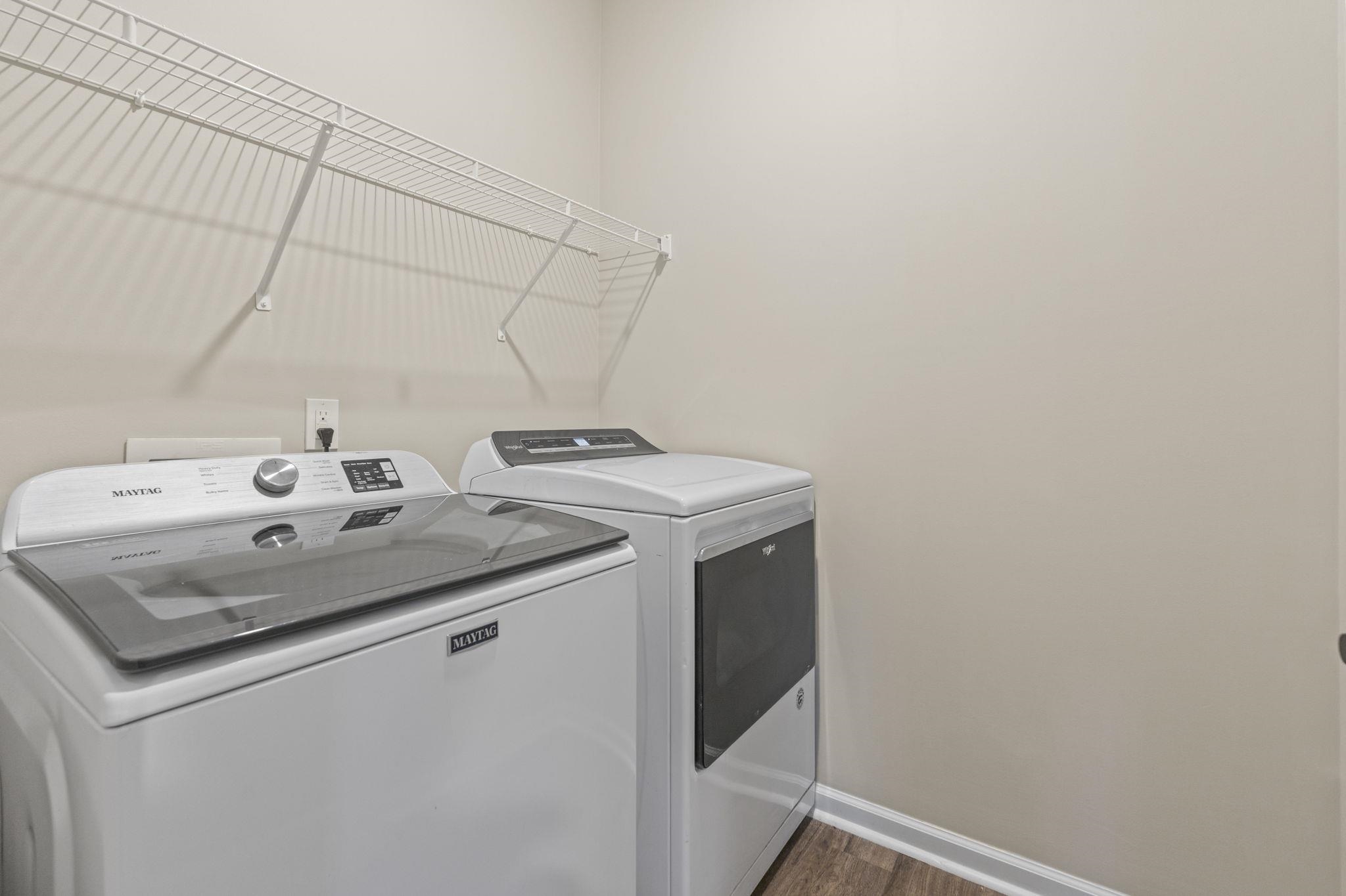 143 Ardeer Court Little River, SC 29566 - Photo 30 of 40 Laundry area with washer and dryer and wood finished floors