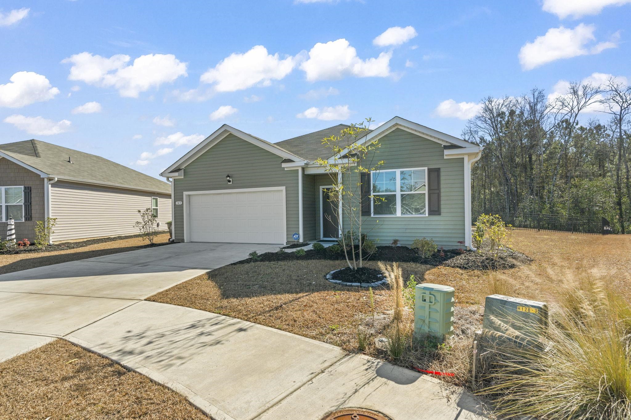 143 Ardeer Court Little River, SC 29566 - Photo 37 of 40 Ranch-style home with driveway and a garage