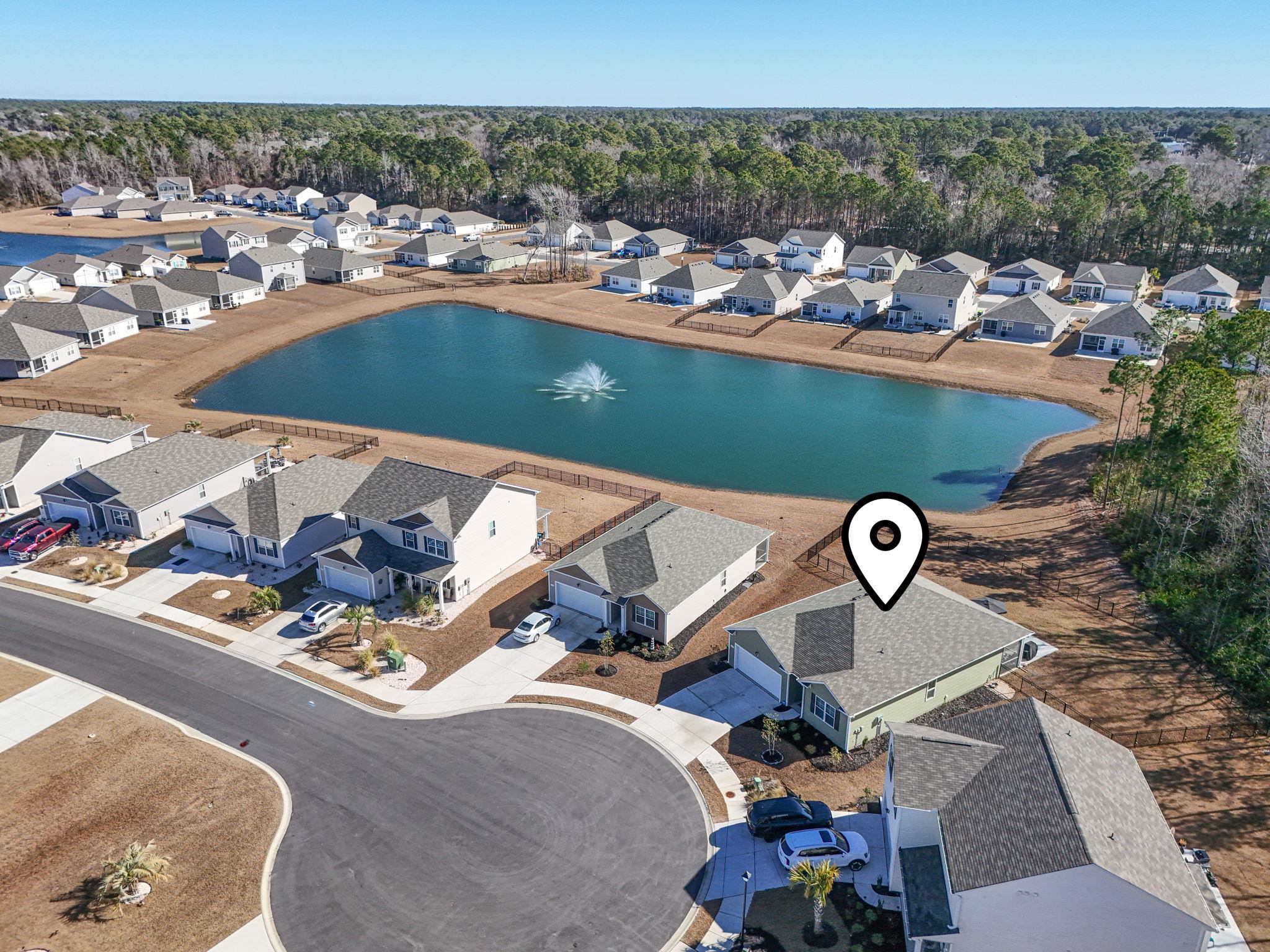 143 Ardeer Court Little River, SC 29566 - Photo 5 of 40 Aerial perspective of suburban area featuring a large body of water