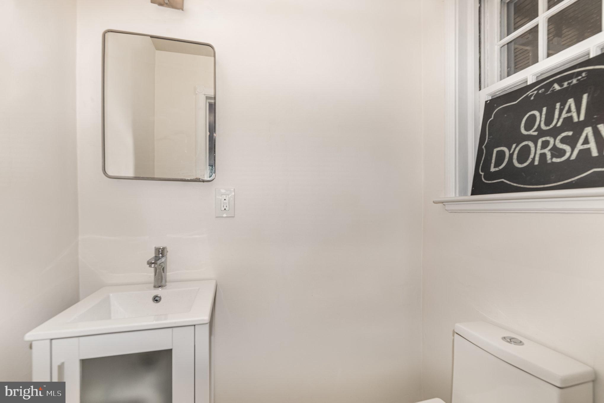 4009 Deepwood Road Baltimore, MD 21218 - Photo 14 of 40 Main Level Powder Room