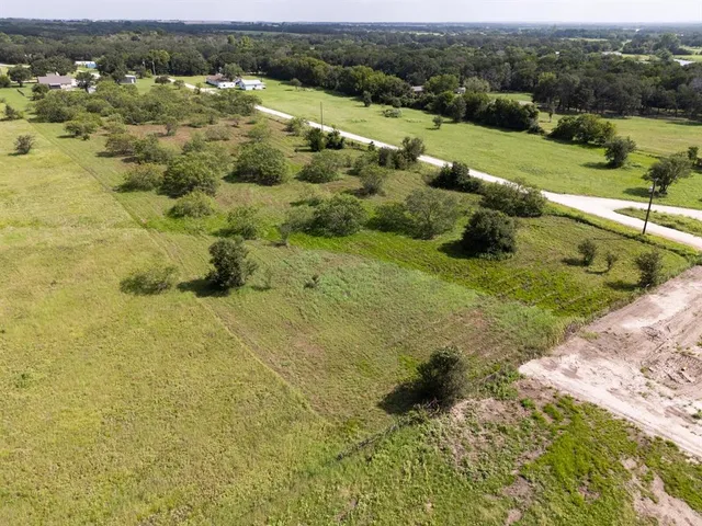 a view of a houses with an outdoor space