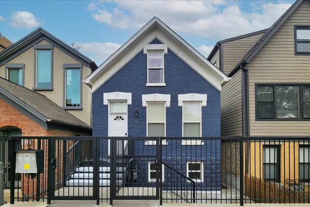 a front view of residential houses