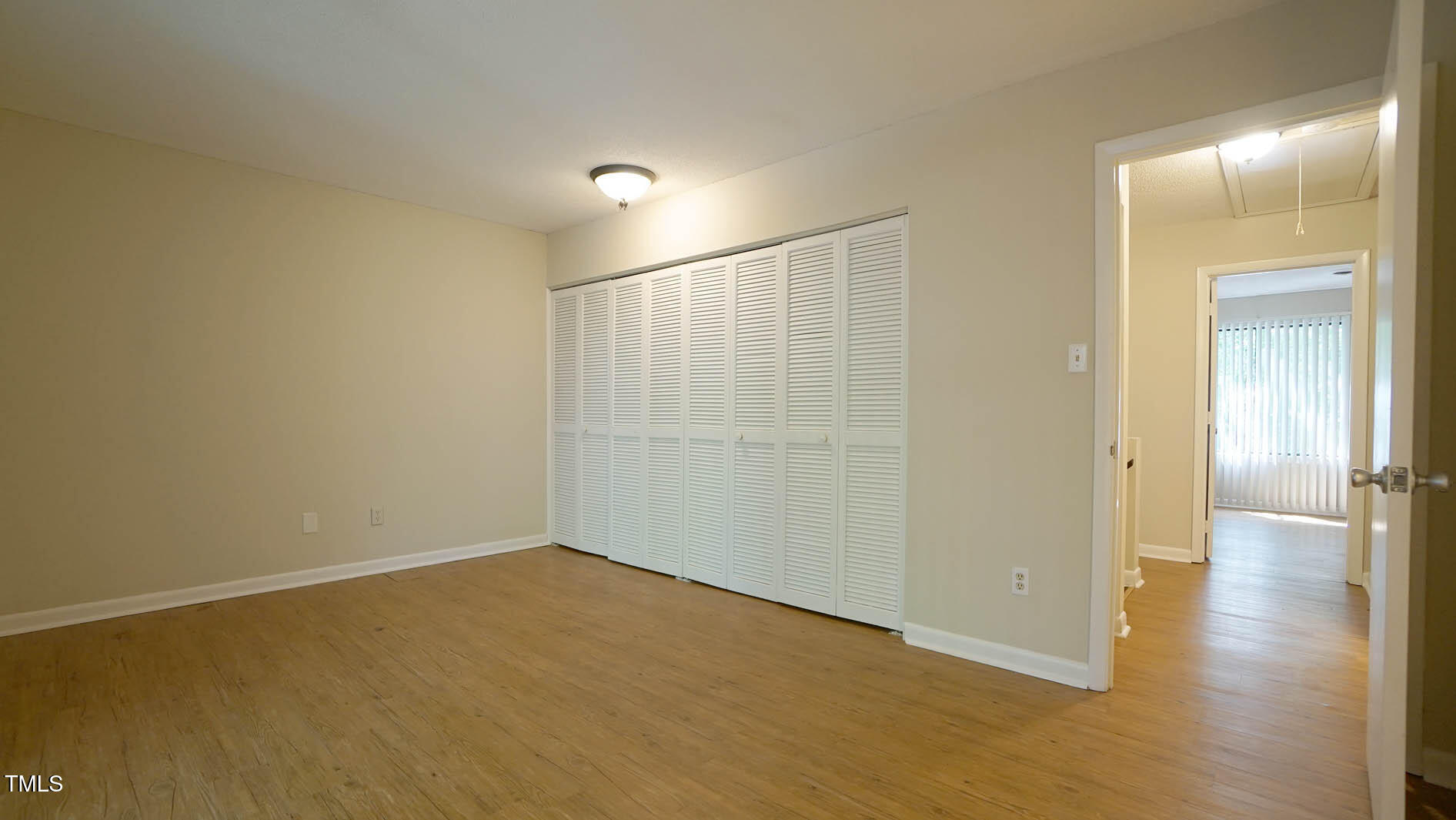 1020 North Bend Drive Raleigh, NC 27609 - Photo 28 of 50 a view of a room with wooden floor
