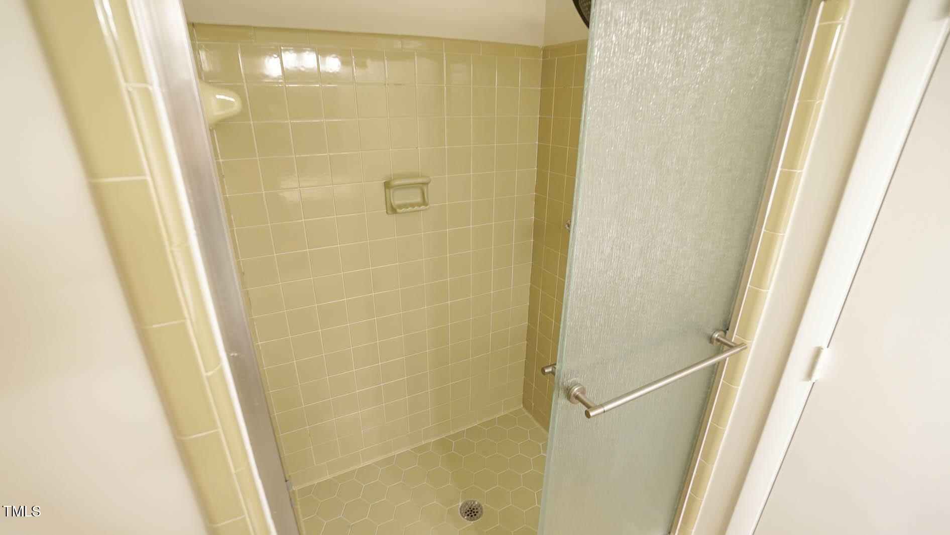 1020 North Bend Drive Raleigh, NC 27609 - Photo 31 of 50 a bathroom with a shower