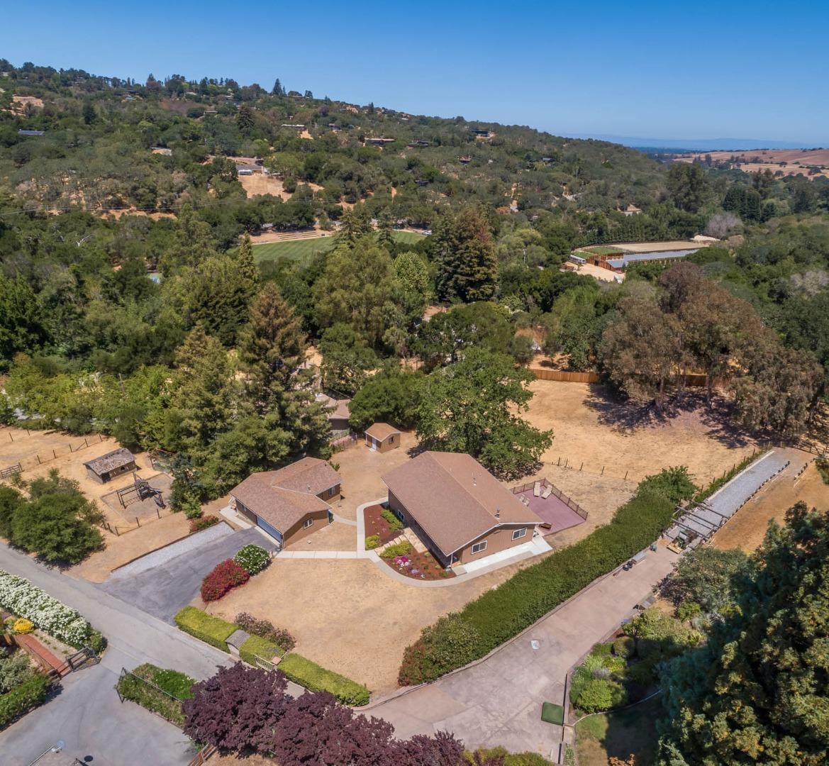 4131 Alpine Road Portola Valley, CA 94028 - Photo 1 of 33 an aerial view of residential houses with outdoor space and street view