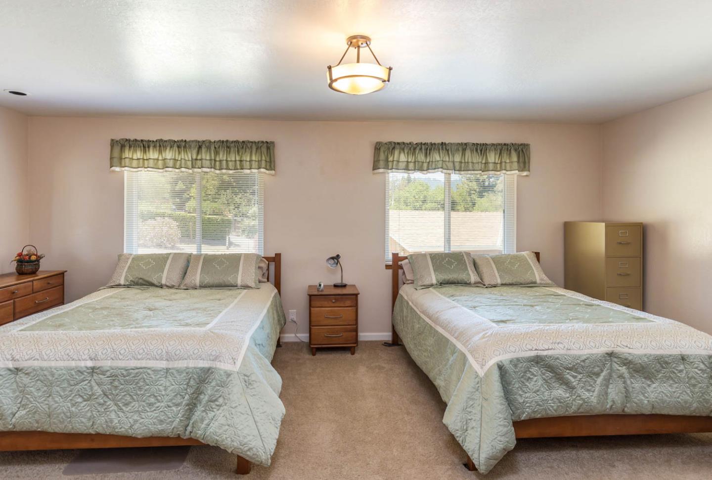 4131 Alpine Road Portola Valley, CA 94028 - Photo 14 of 33 a bedroom with a bed and window