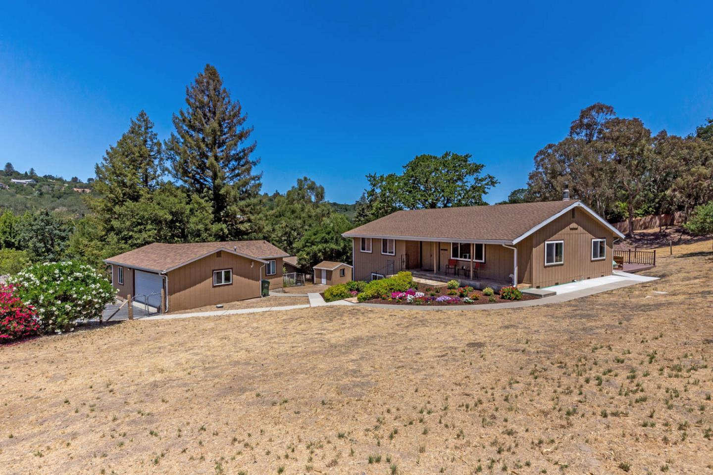 4131 Alpine Road Portola Valley, CA 94028 - Photo 3 of 33 front view of a house with a yard