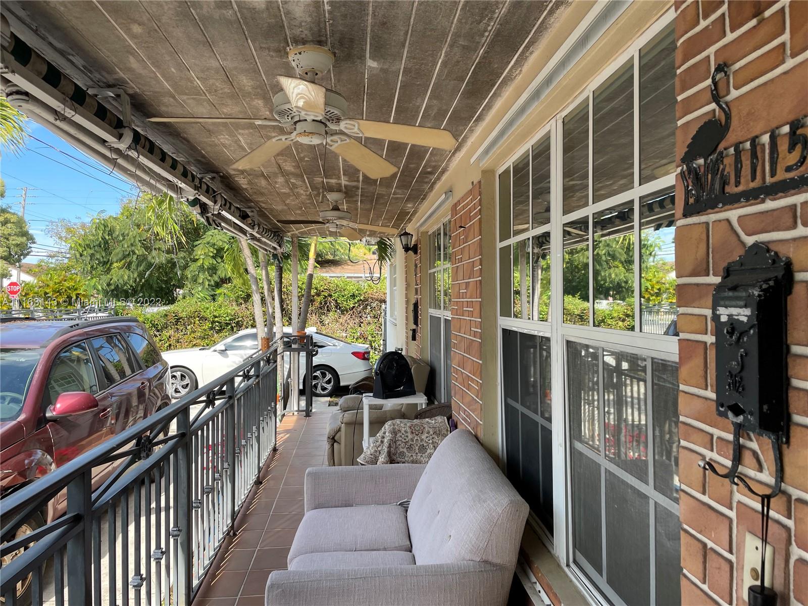 1111 Southwest 11th Avenue Miami, FL 33129 - Photo 20 of 28 a view of a porch with furniture