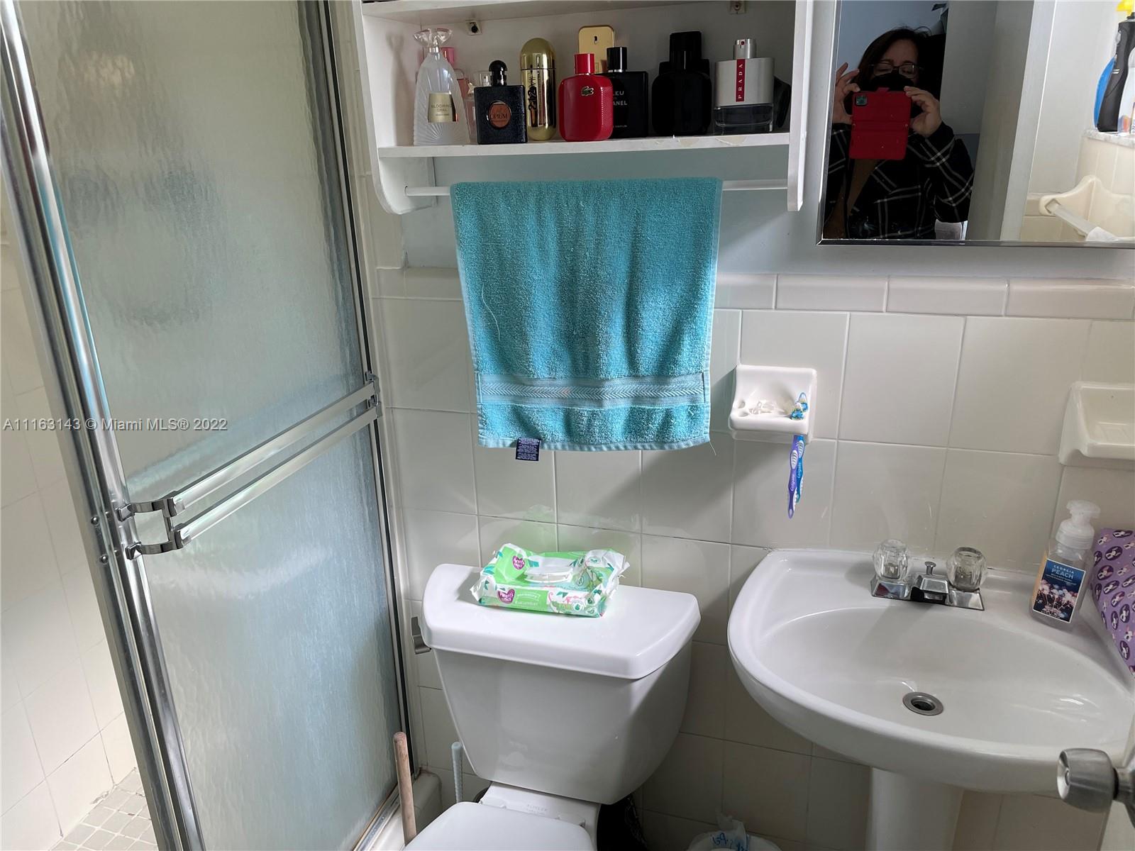 1111 Southwest 11th Avenue Miami, FL 33129 - Photo 25 of 28 a bathroom with a sink and a mirror