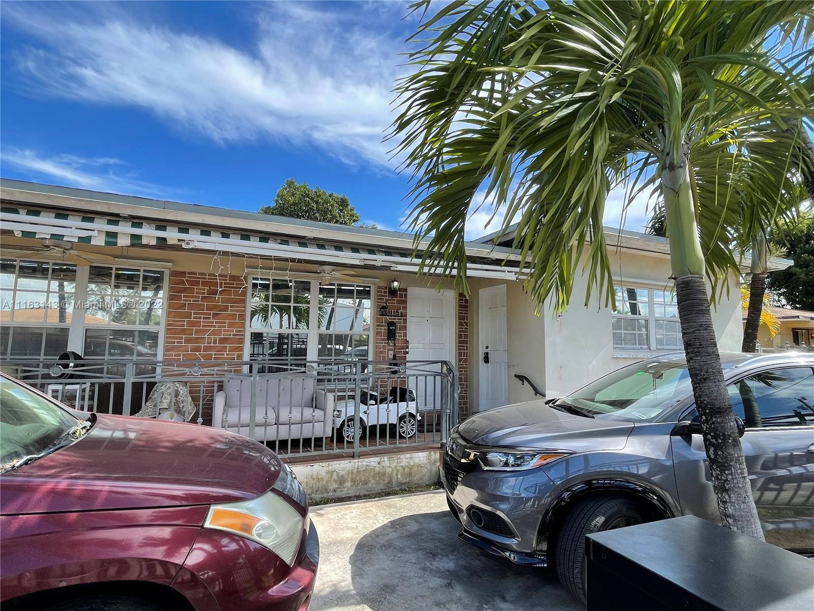 1111 Southwest 11th Avenue Miami, FL 33129 - Photo 7 of 28 a front view of house with outdoor seating