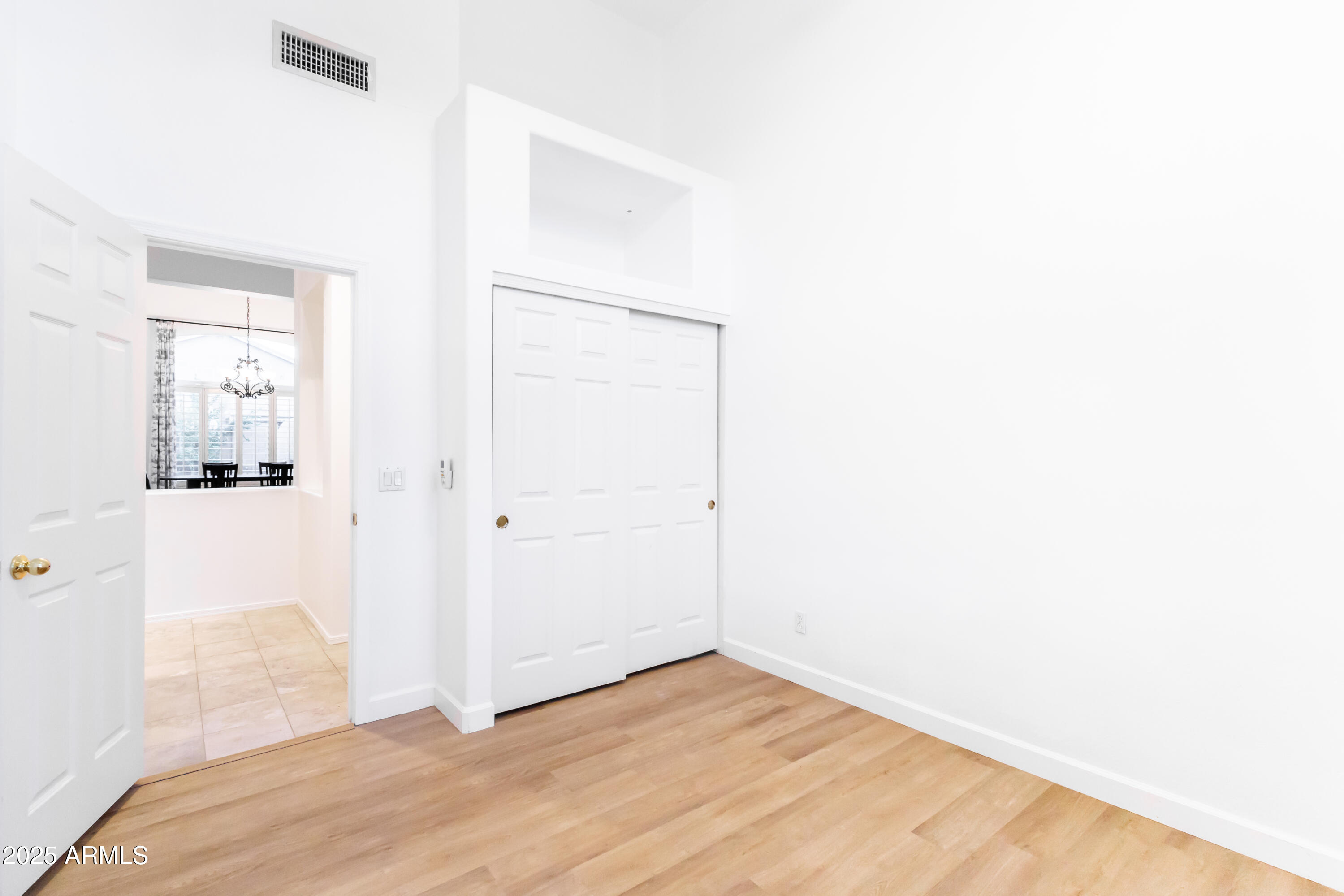 696 West Del Rio Street Gilbert, AZ 85233 - Photo 14 of 39 a view of a room with wooden floor and bathroom