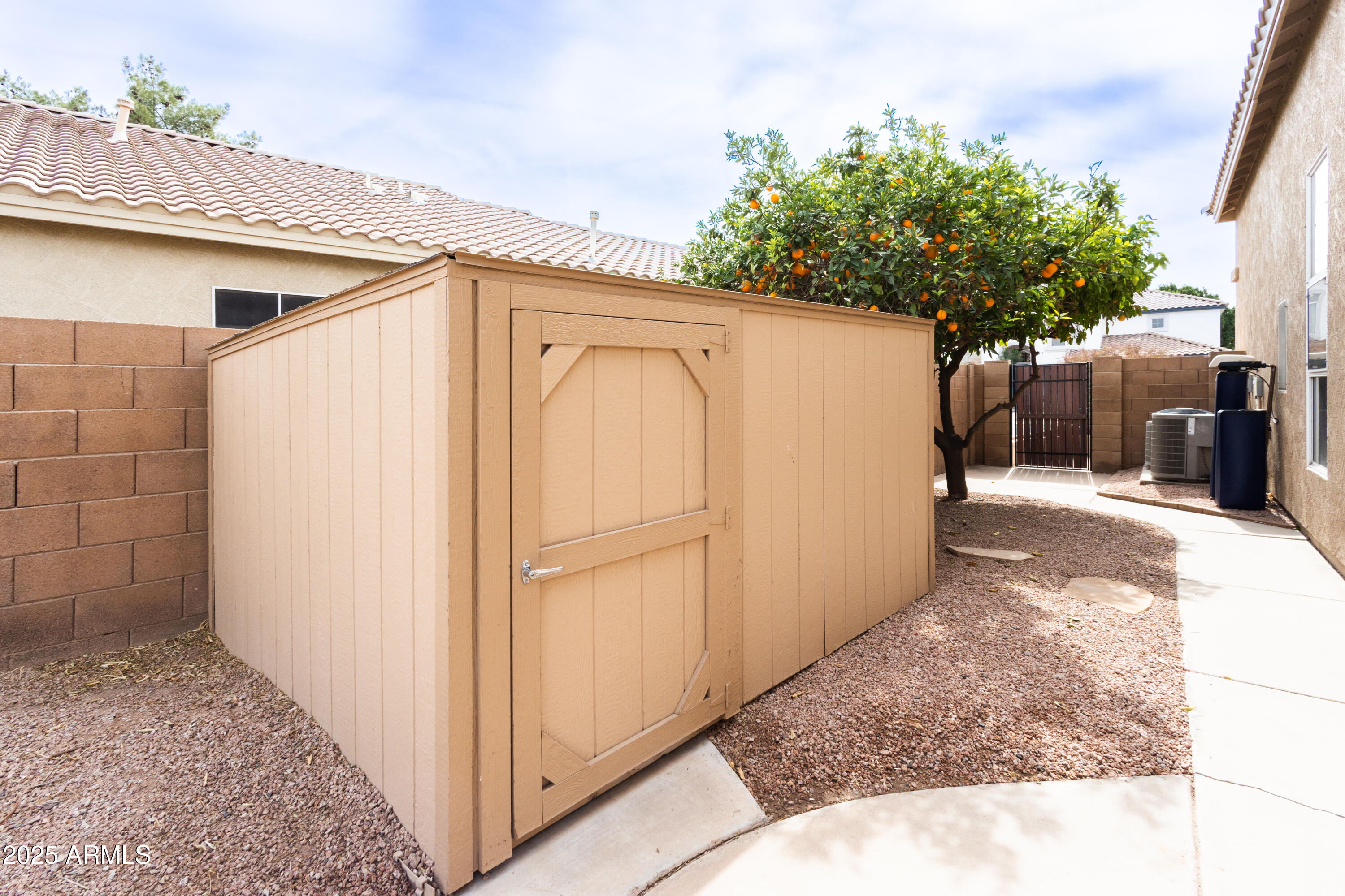 696 West Del Rio Street Gilbert, AZ 85233 - Photo 32 of 39 a view of a house with backyard