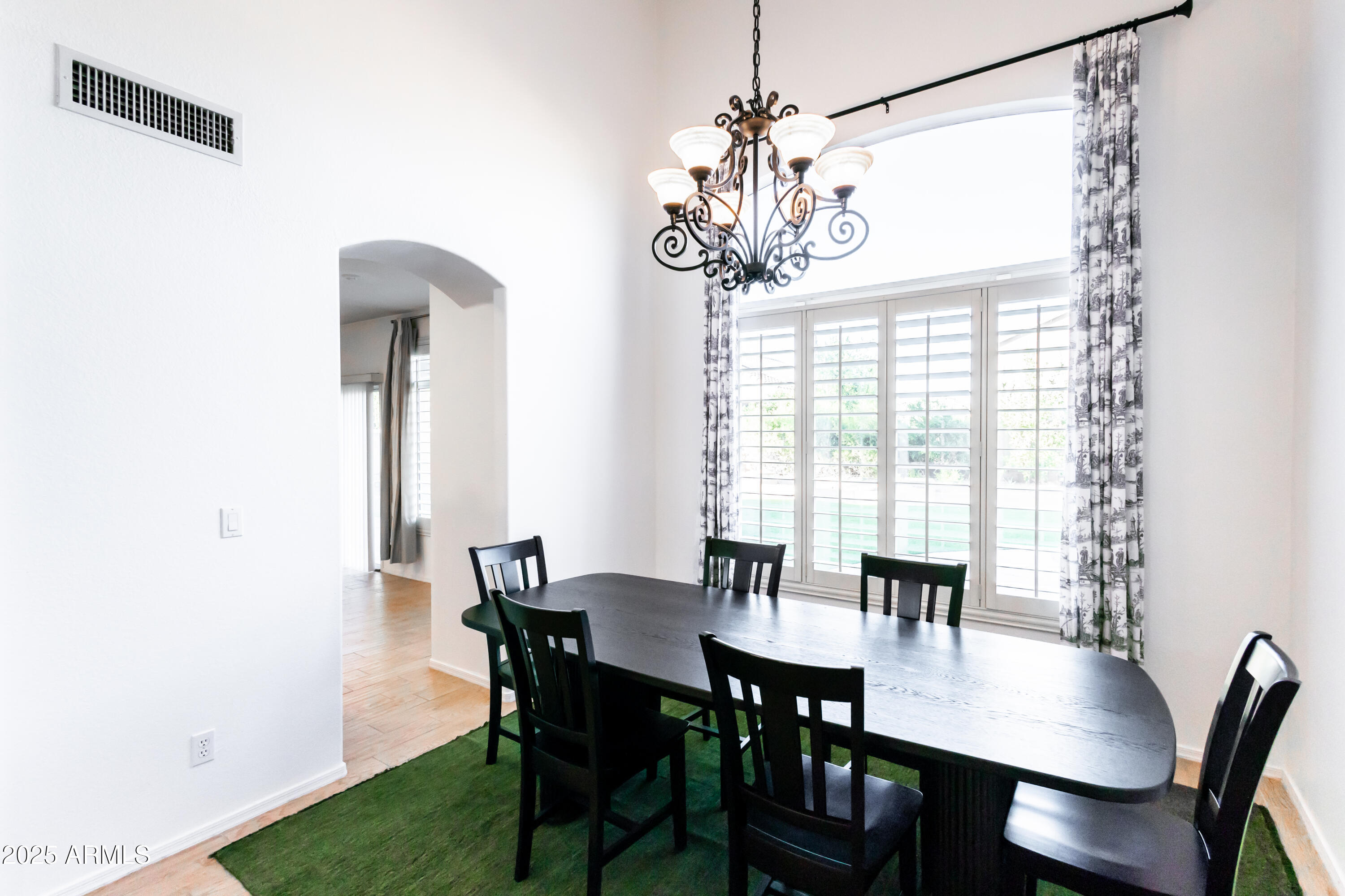 696 West Del Rio Street Gilbert, AZ 85233 - Photo 5 of 39 a view of a dining room with furniture window and outside view
