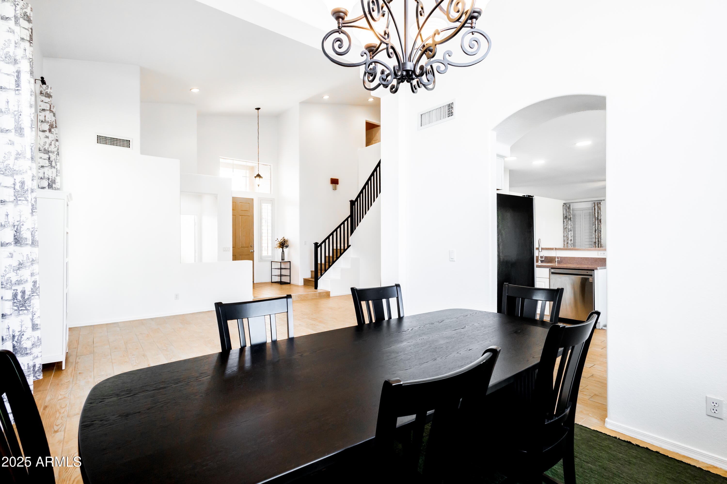 696 West Del Rio Street Gilbert, AZ 85233 - Photo 6 of 39 a view of a dining room with furniture