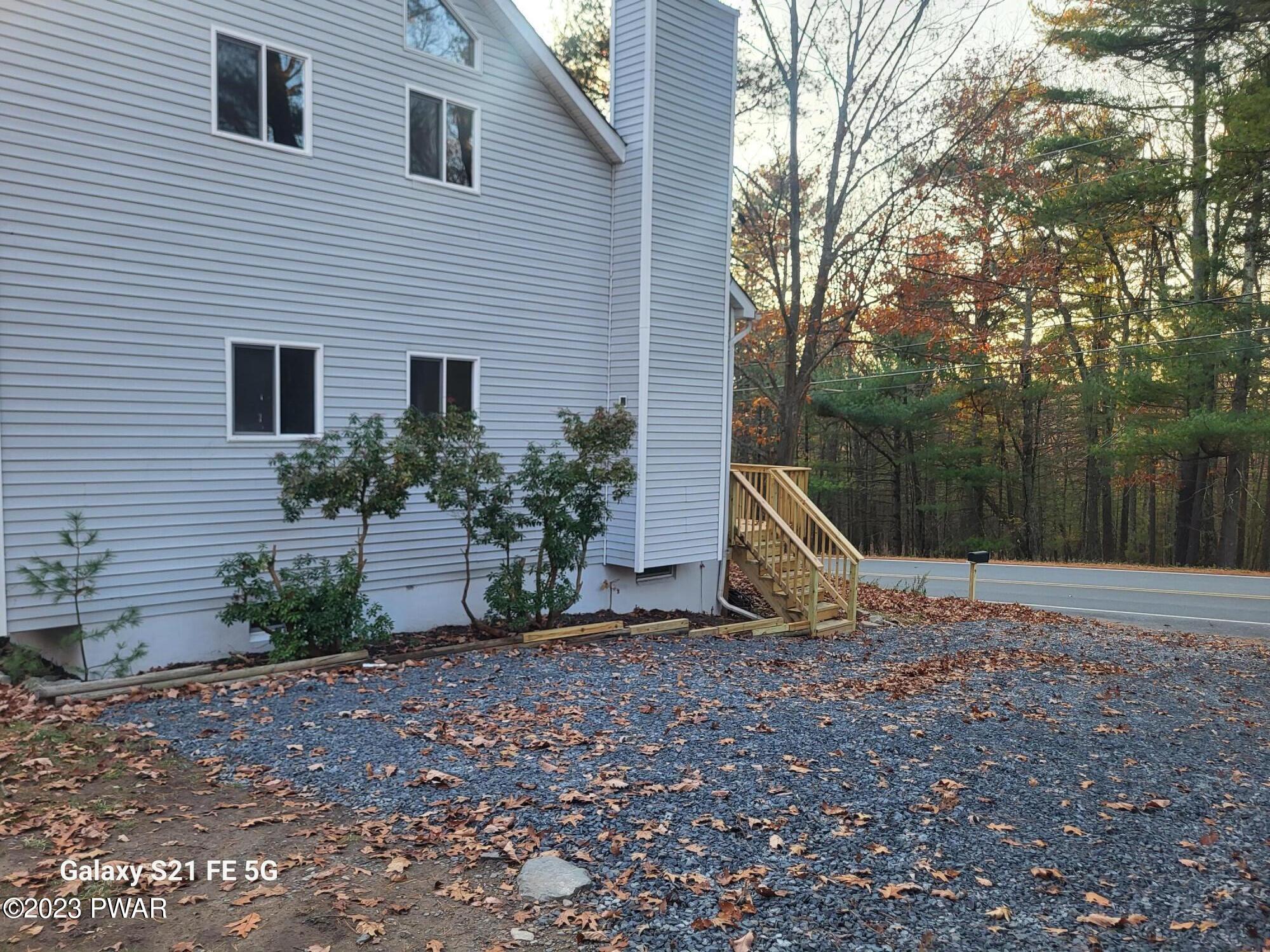 176 Doolan Road Dingmans Ferry, PA 18328 - Photo 22 of 23 Side & Driveway