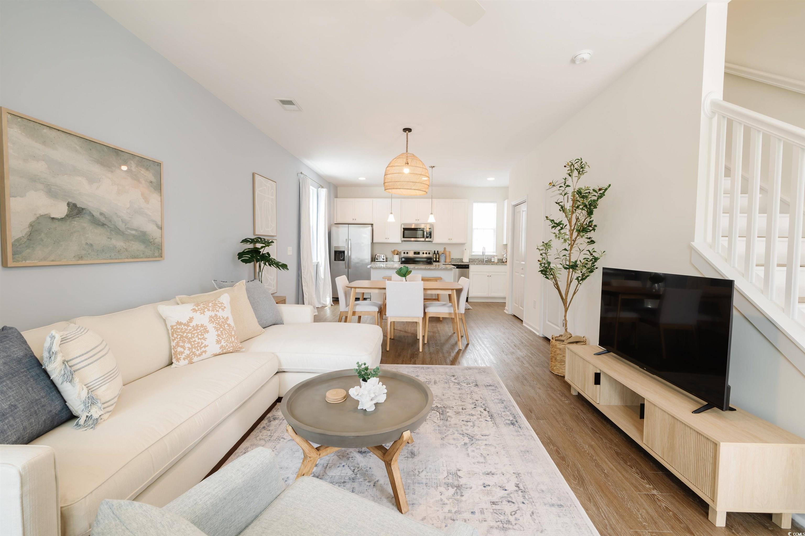 3553 Ladybank Loop Myrtle Beach, SC 29577 - Photo 12 of 30 Living room featuring light wood-style flooring an