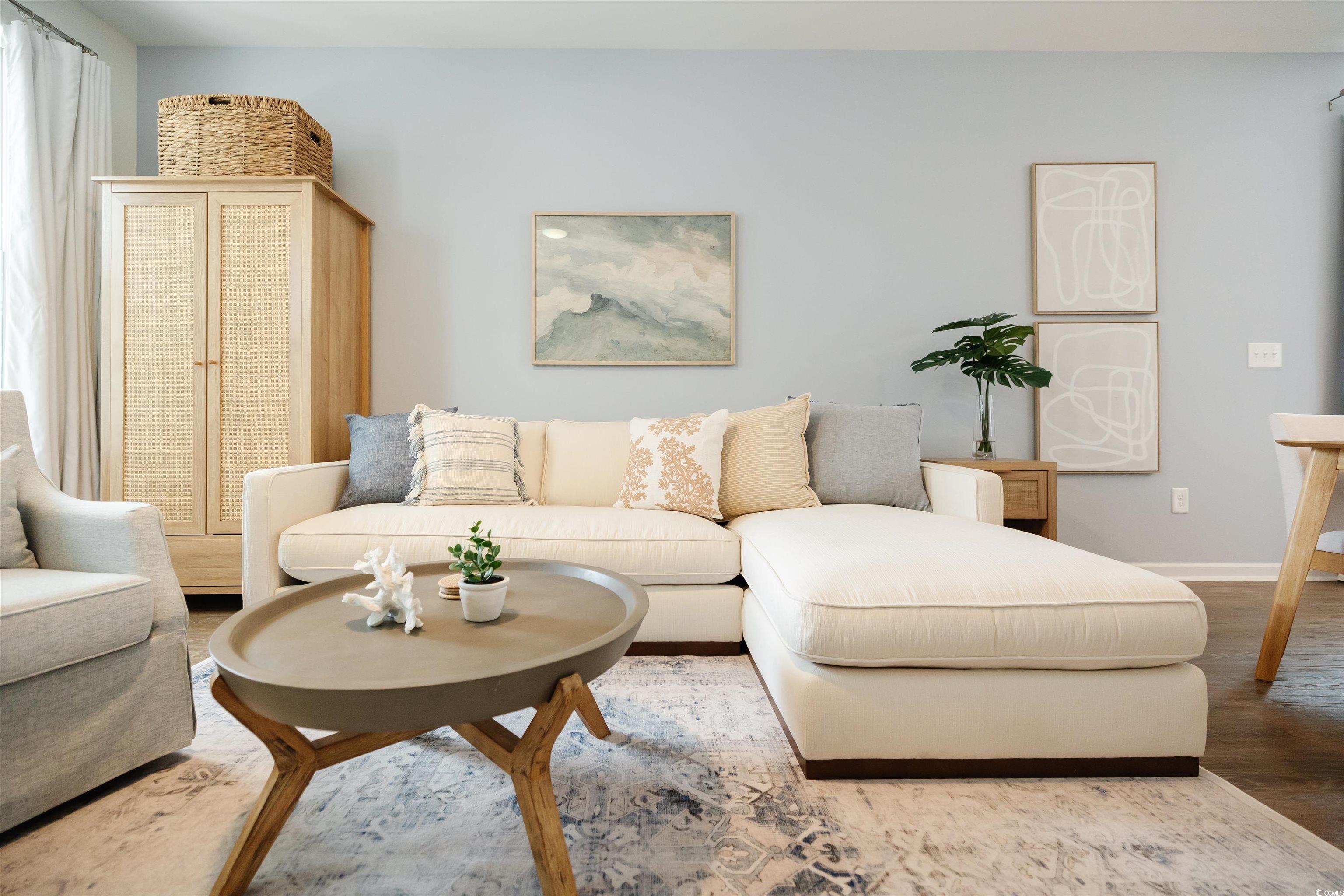 3553 Ladybank Loop Myrtle Beach, SC 29577 - Photo 13 of 30 Living room featuring wood finished floors and bas