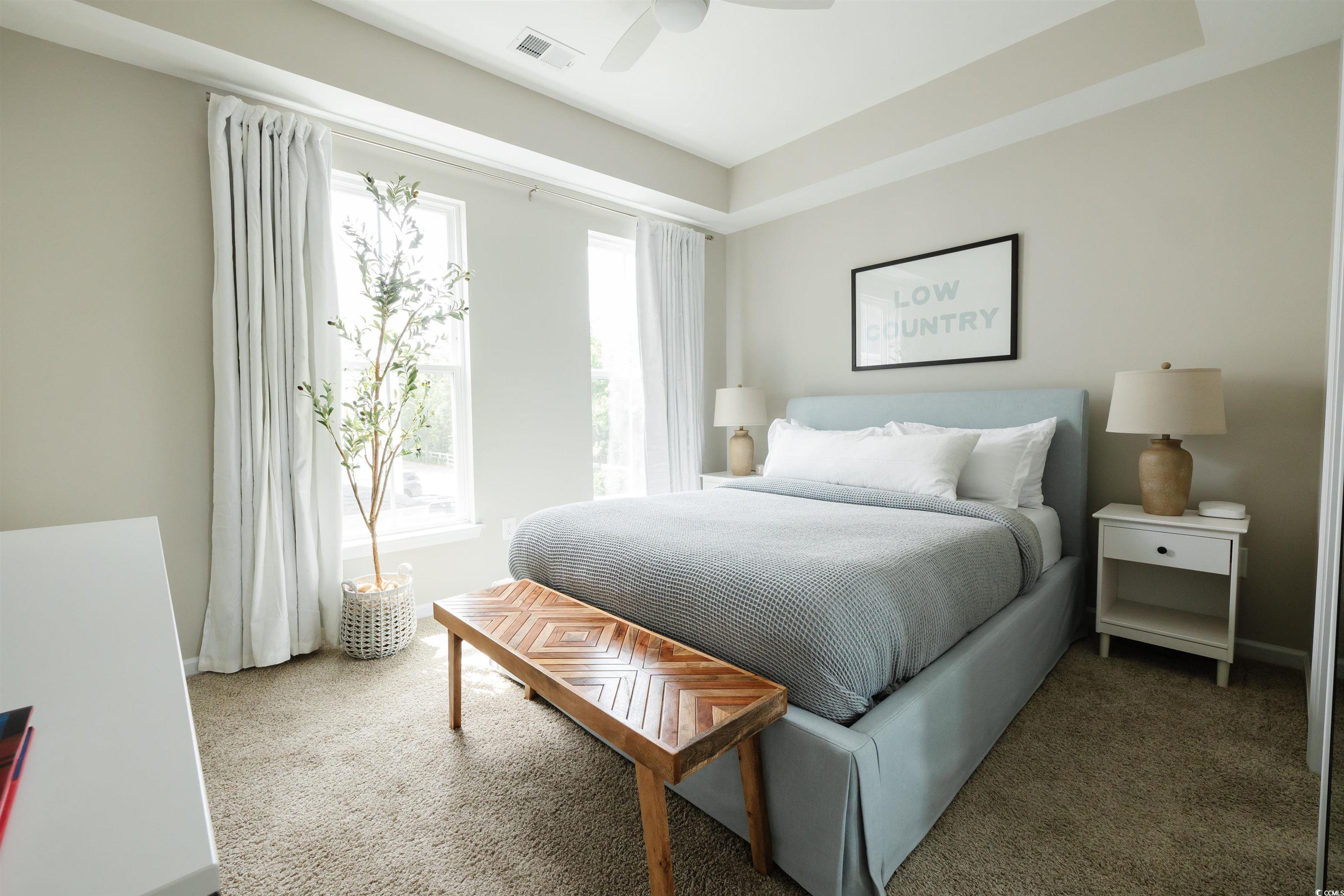 3553 Ladybank Loop Myrtle Beach, SC 29577 - Photo 22 of 30 Carpeted bedroom featuring ceiling fan and a raise