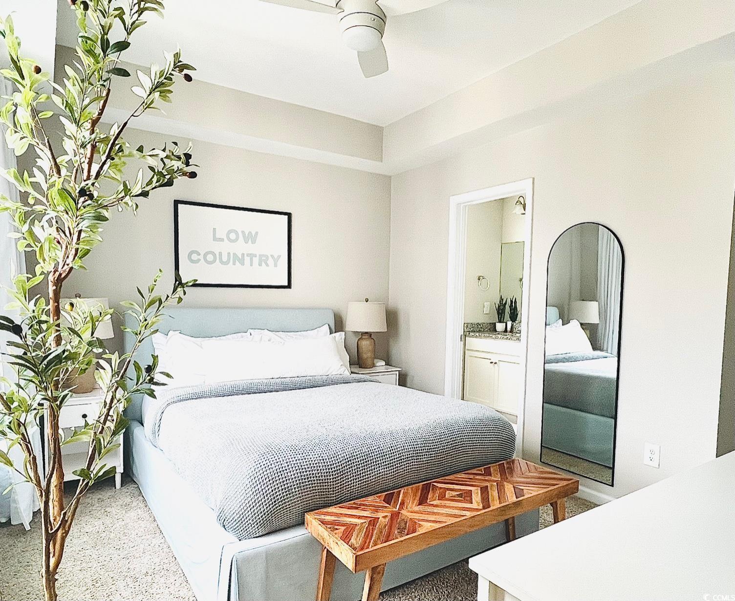 3553 Ladybank Loop Myrtle Beach, SC 29577 - Photo 24 of 30 Bedroom with connected bathroom and a ceiling fan