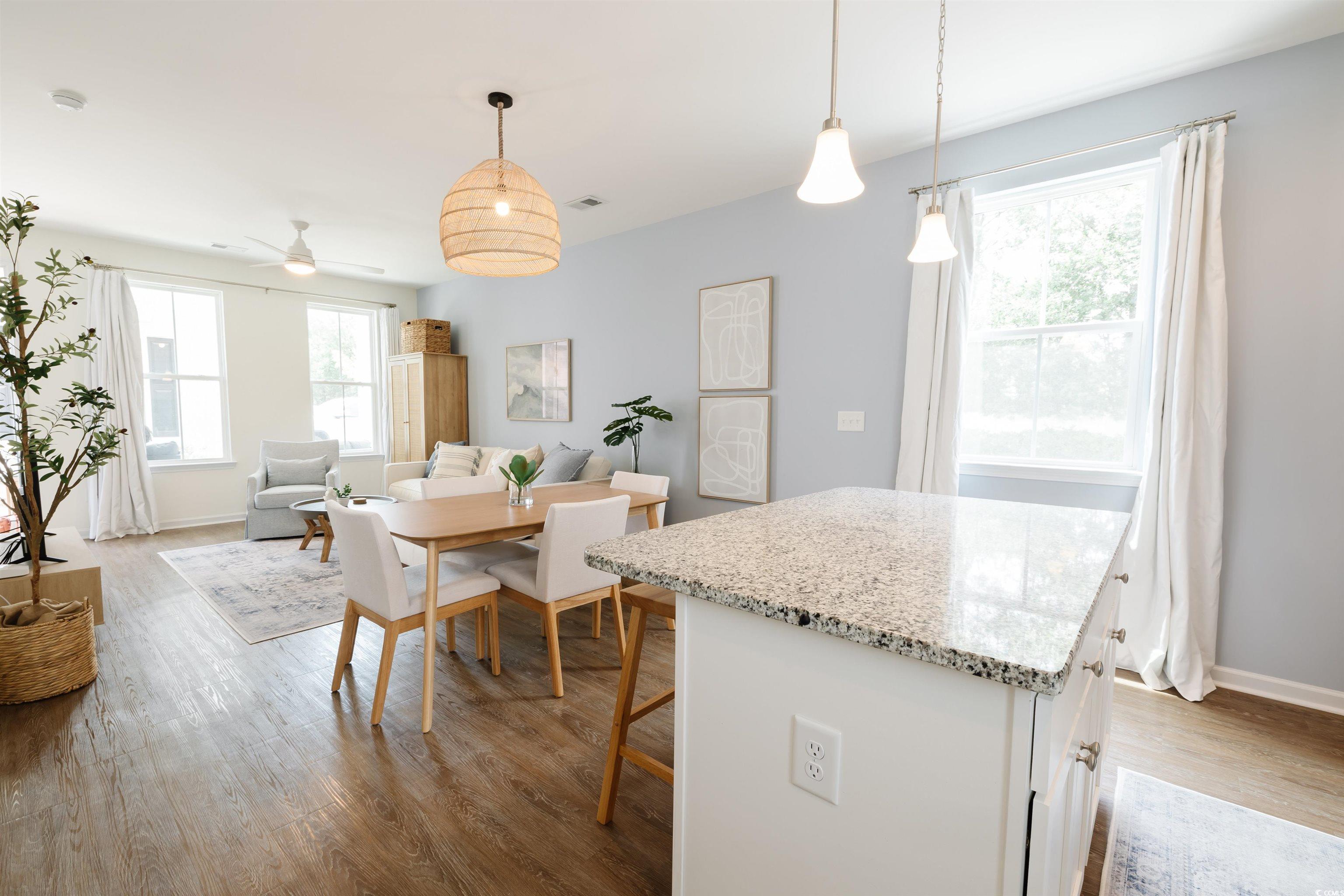 3553 Ladybank Loop Myrtle Beach, SC 29577 - Photo 4 of 30 Kitchen featuring hanging light fixtures, a kitche