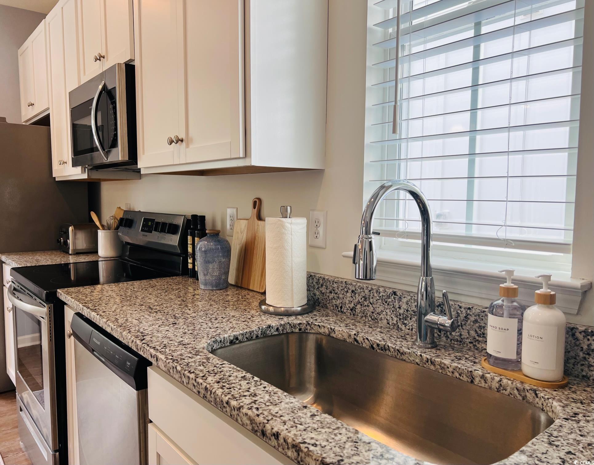 3553 Ladybank Loop Myrtle Beach, SC 29577 - Photo 7 of 30 Kitchen with appliances with stainless steel finis