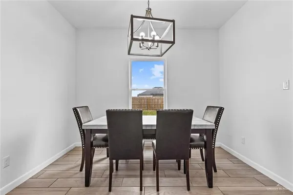 a view of a dining room with furniture