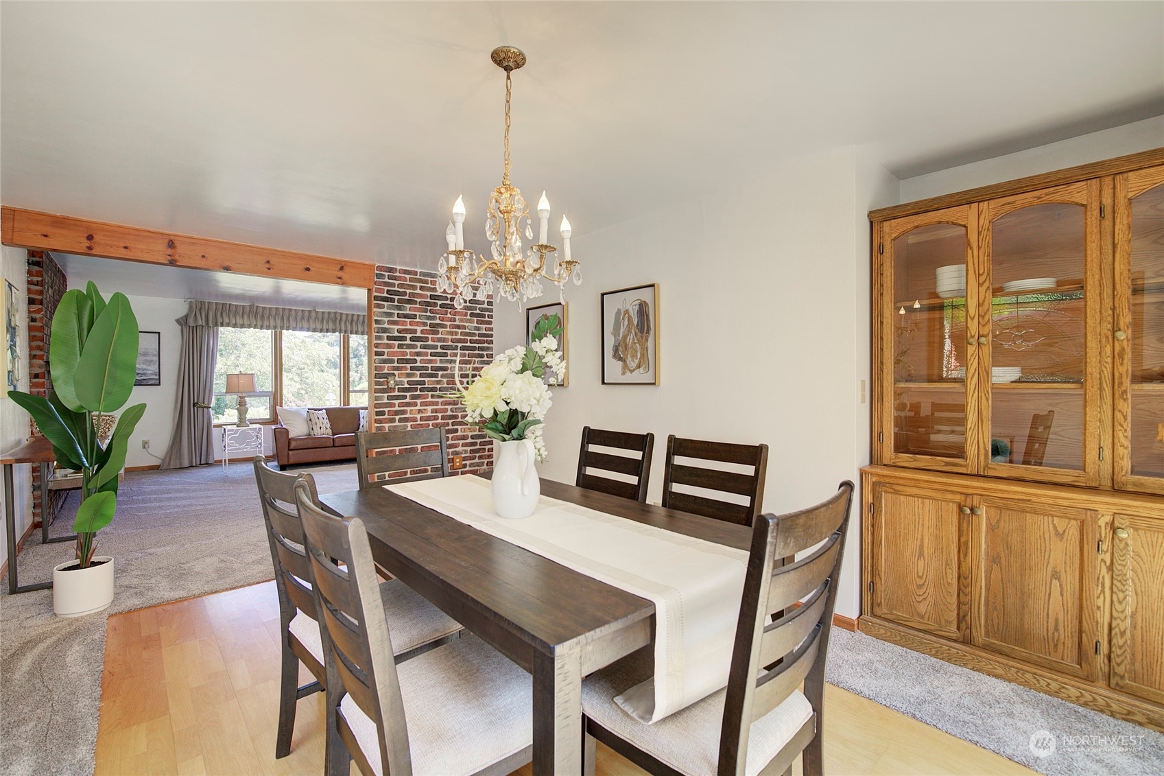 8500 Talbot Road Edmonds, WA 98026 - Photo 7 of 30 a view of a dining room with furniture window and wooden floor