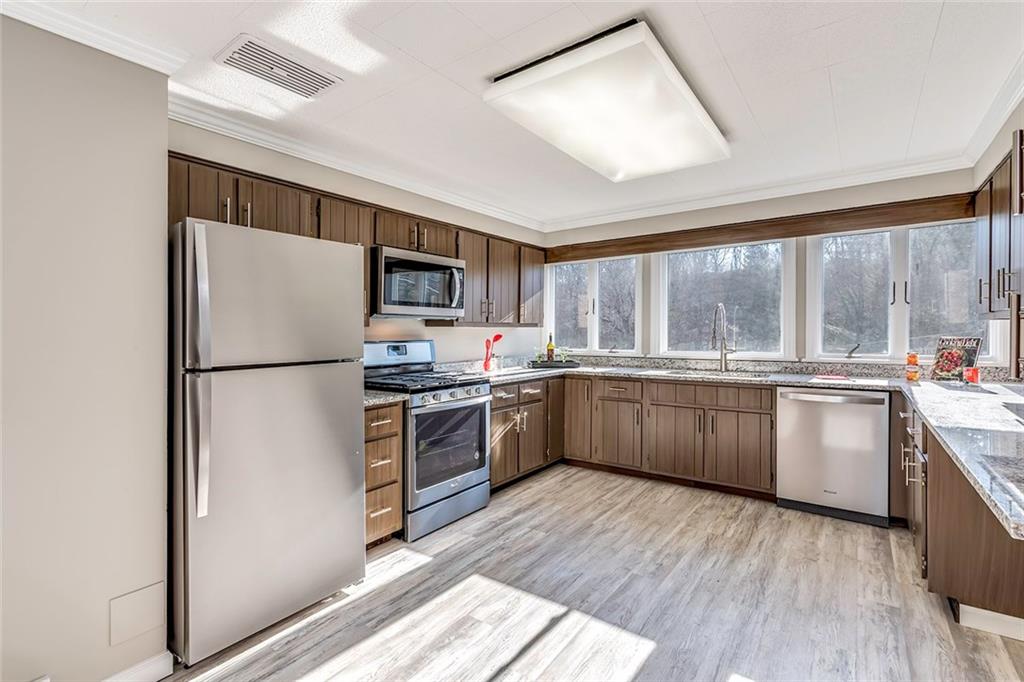 2519 Collins Road Pittsburgh, PA 15235 - Photo 8 of 25 HUGE Kitchen with New Granite Counter Tops and All New Stainless Whirpool Appliances