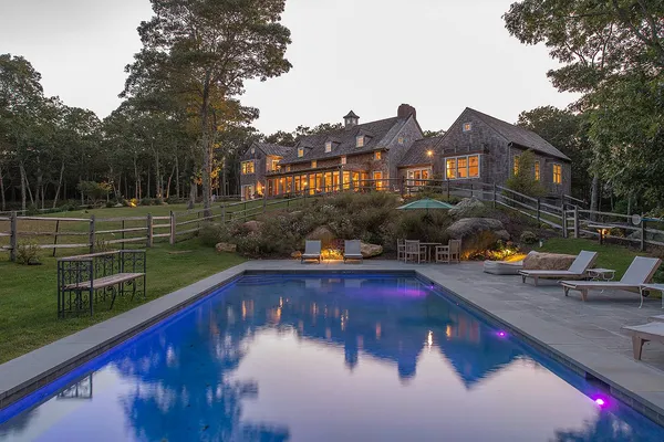 a view of yard with swimming pool and outdoor seating