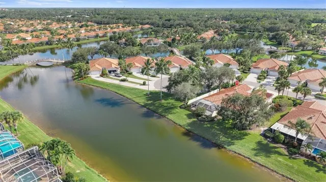 an aerial view of lake residential houses with outdoor space and river