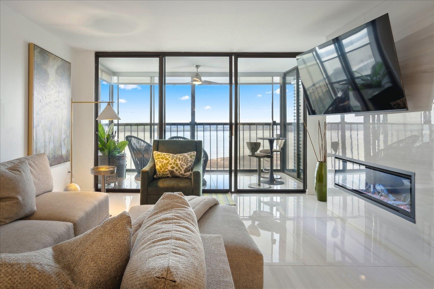 200 Wagner Place, Unit 1203 Memphis, TN 38103 - Photo 11 of 34 a living room with furniture large window and a flat screen tv
