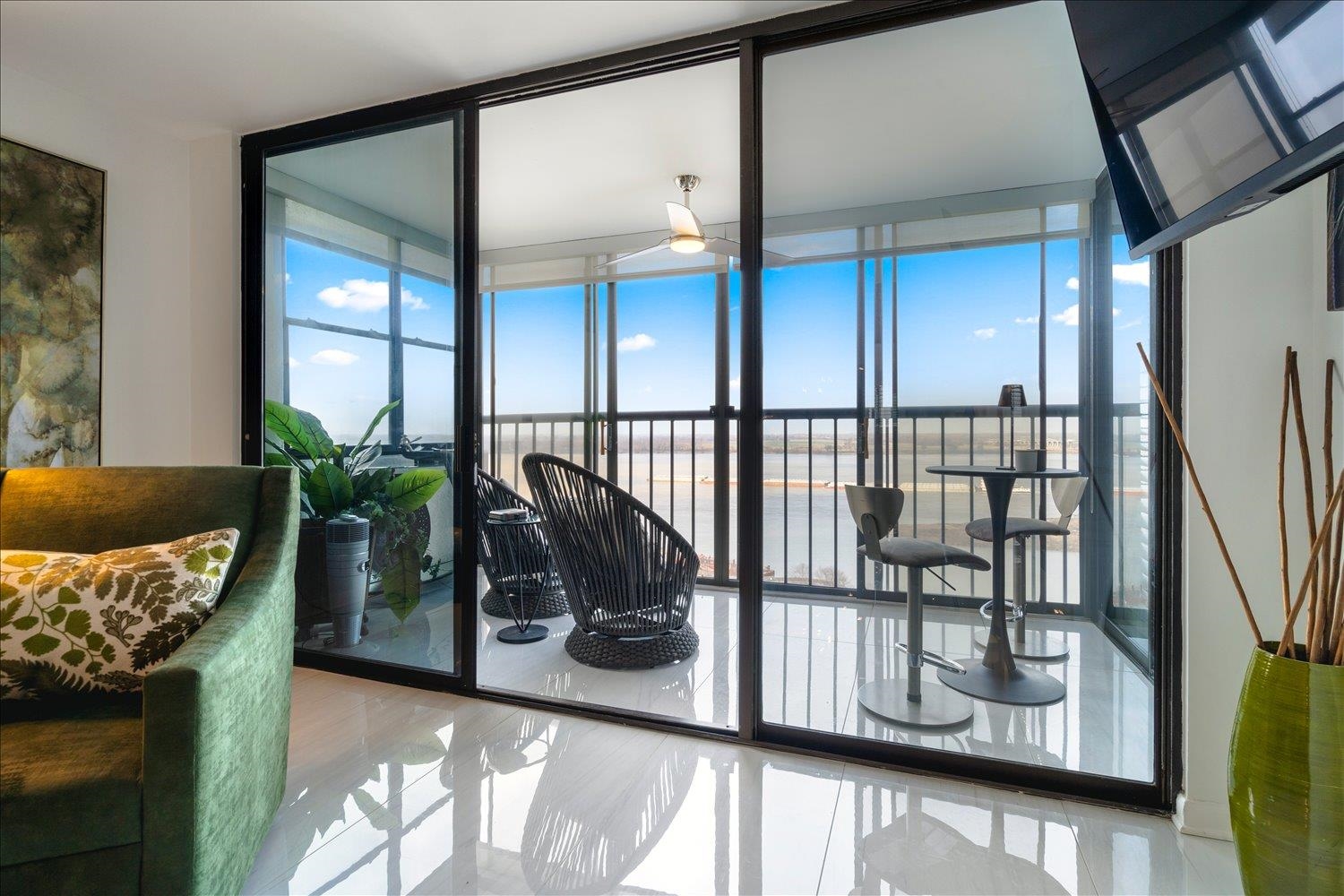 200 Wagner Place, Unit 1203 Memphis, TN 38103 - Photo 14 of 34 a living room with furniture and a floor to ceiling window