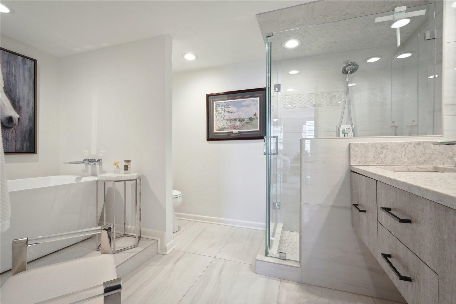 200 Wagner Place, Unit 1203 Memphis, TN 38103 - Photo 20 of 34 a bathroom with a sink mirror and a shower