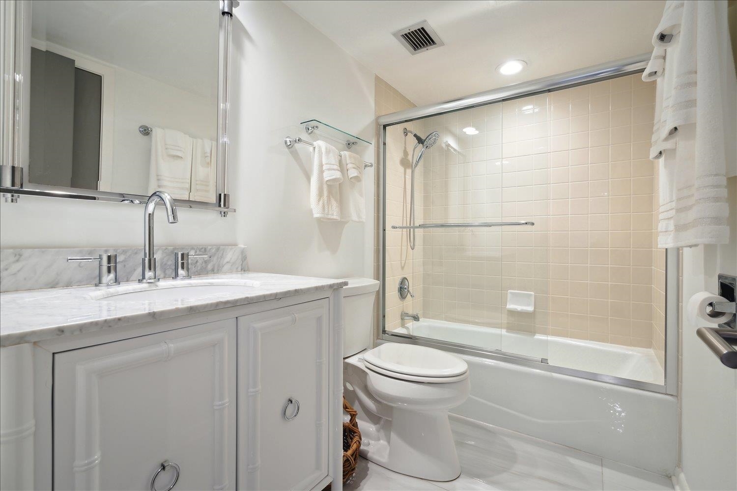 200 Wagner Place, Unit 1203 Memphis, TN 38103 - Photo 24 of 34 a bathroom with a granite countertop sink toilet and shower