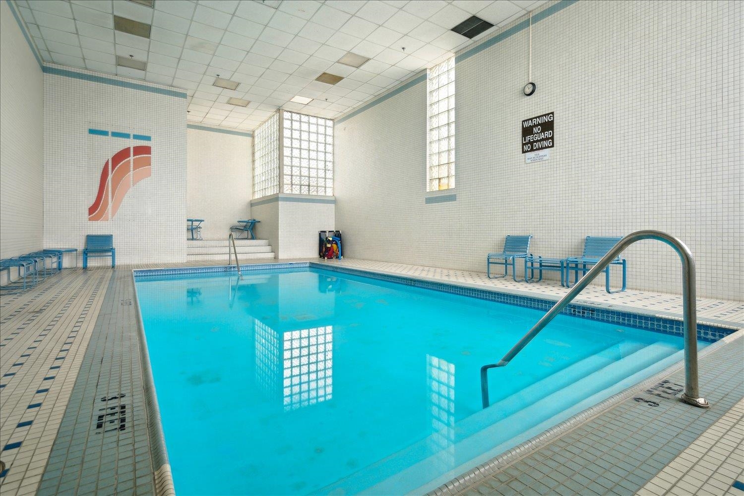 200 Wagner Place, Unit 1203 Memphis, TN 38103 - Photo 29 of 34 a view of a kitchen with kitchen island a sink and wooden floor