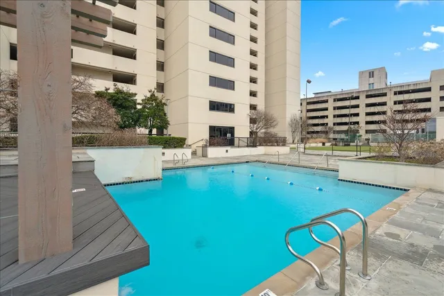 a view of a kitchen with dining area and windows