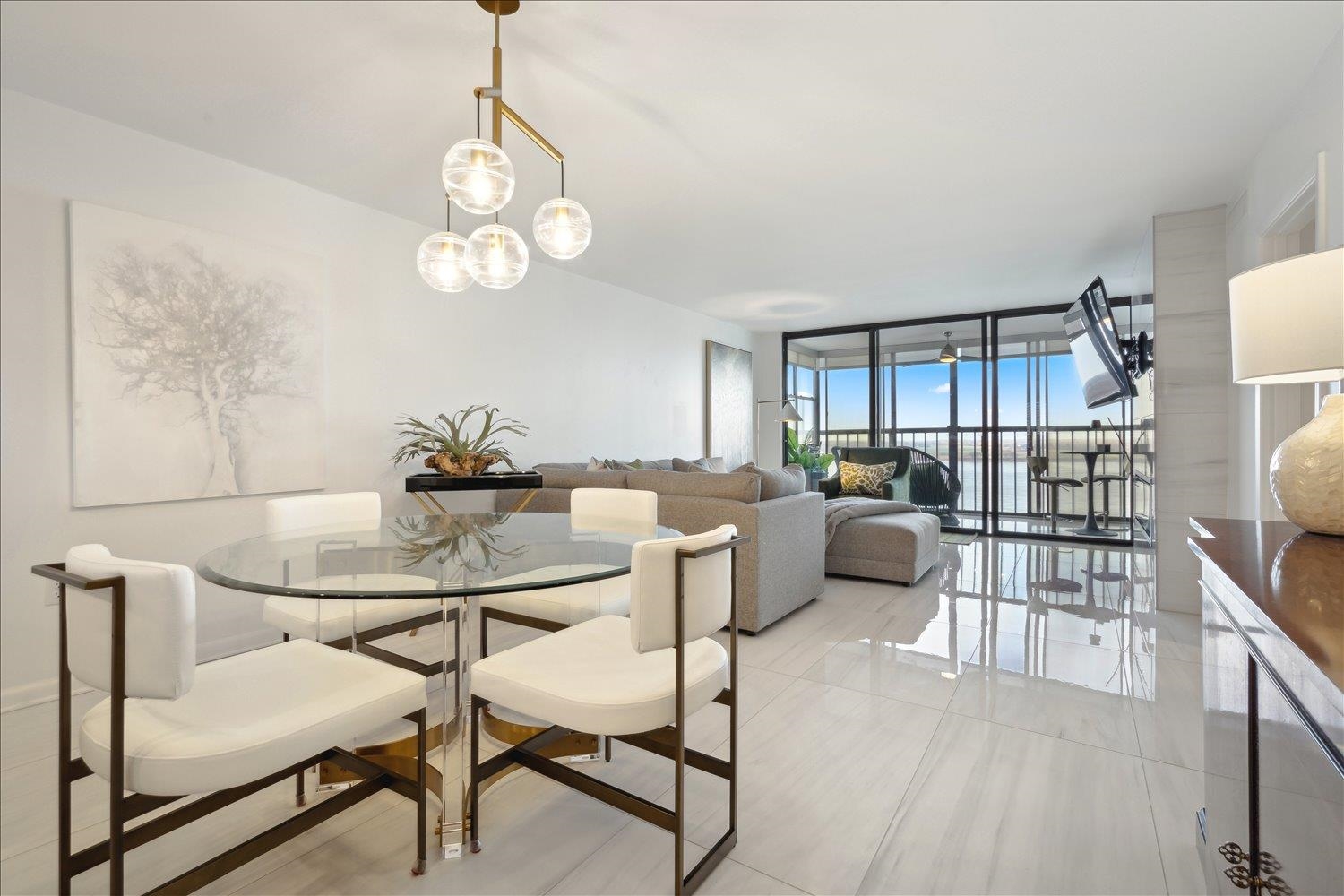 200 Wagner Place, Unit 1203 Memphis, TN 38103 - Photo 10 of 34 a view of a dining room with furniture and wooden floor