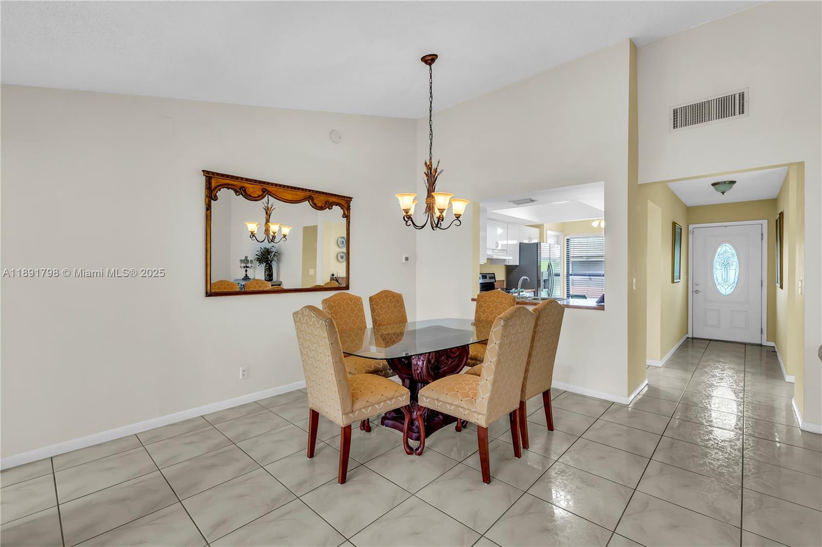 2000 Southwest 15th Place Deerfield Beach, FL 33442 - Photo 13 of 33 a dining room with furniture and window
