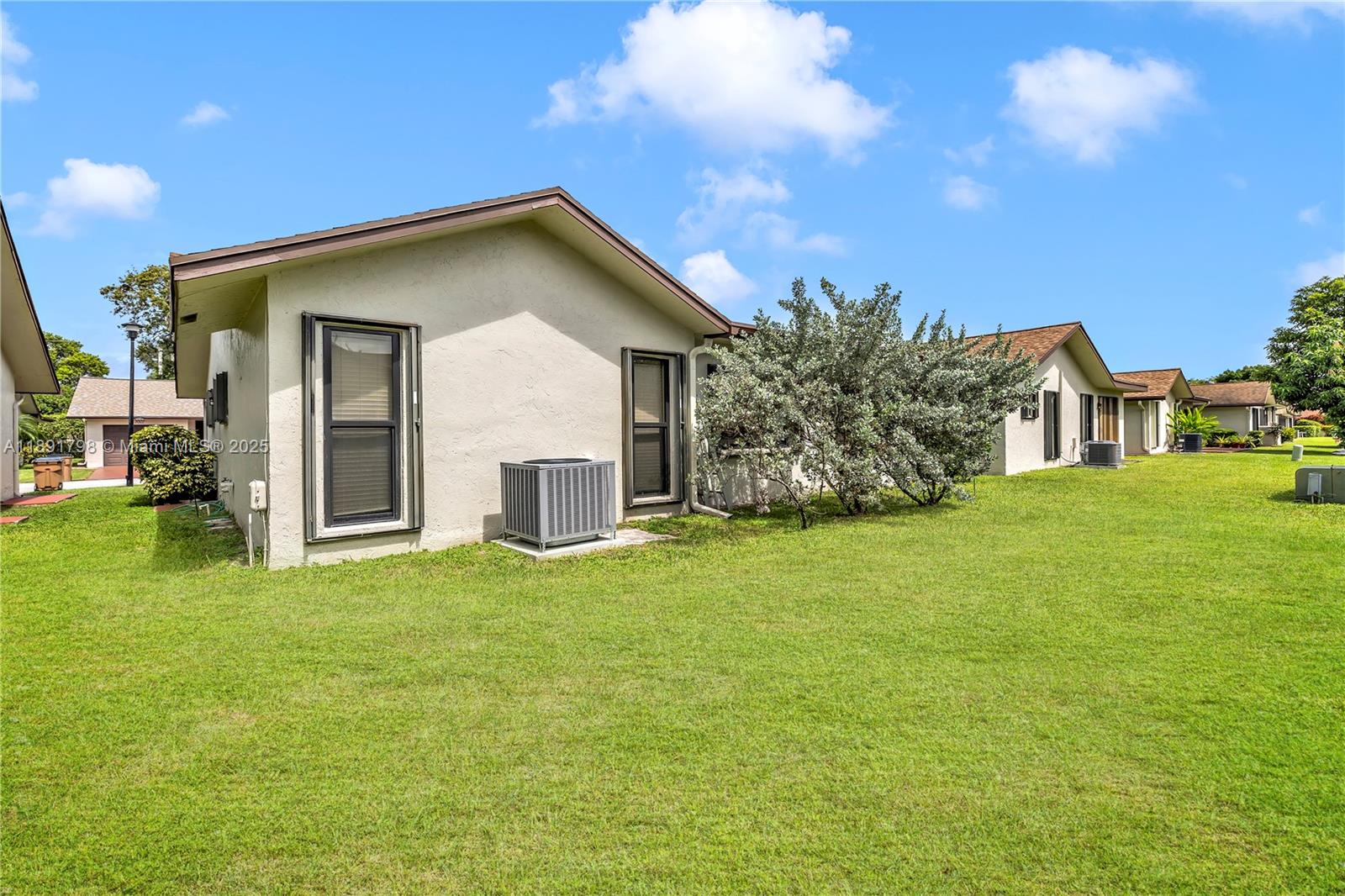 2000 Southwest 15th Place Deerfield Beach, FL 33442 - Photo 24 of 33 a view of a house with a yard