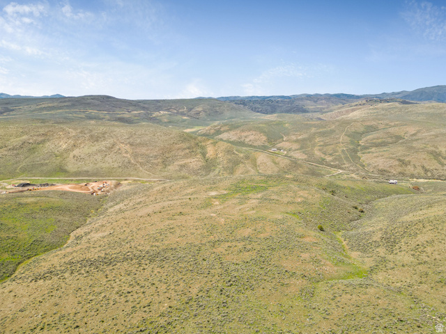 55 Browns Canyon Road, Unit 55 Peoa, UT 84061 - Photo 16 of 17 View of rural area with a mountain backdrop