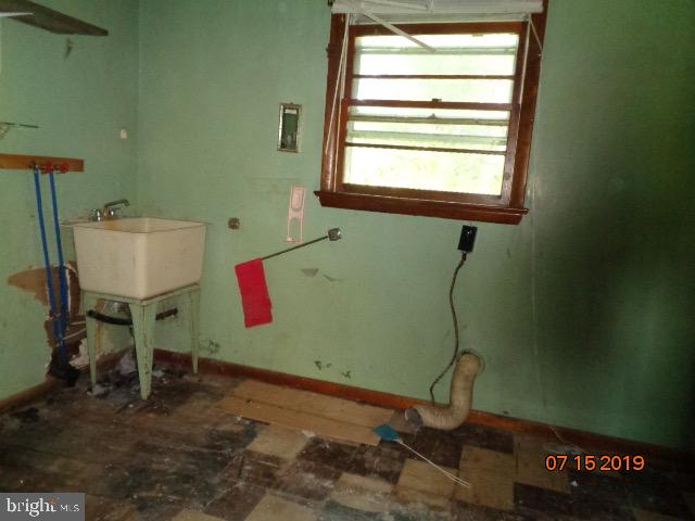 17 Tilbury Road Salem, NJ 08079 - Photo 12 of 17 a room with pool table and windows