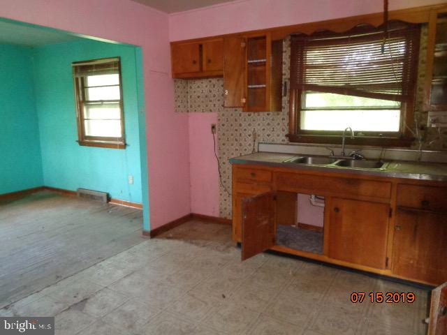 17 Tilbury Road Salem, NJ 08079 - Photo 9 of 17 a kitchen that has a sink and a window