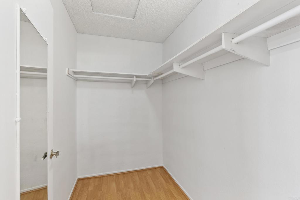 1850 Paradise Hills Road San Diego, CA 92114 - Photo 24 of 39 a view of a room with shelf on the wall