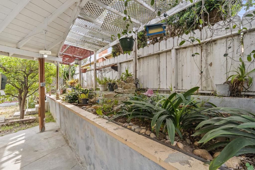 1850 Paradise Hills Road San Diego, CA 92114 - Photo 35 of 39 a view of a backyard with plants