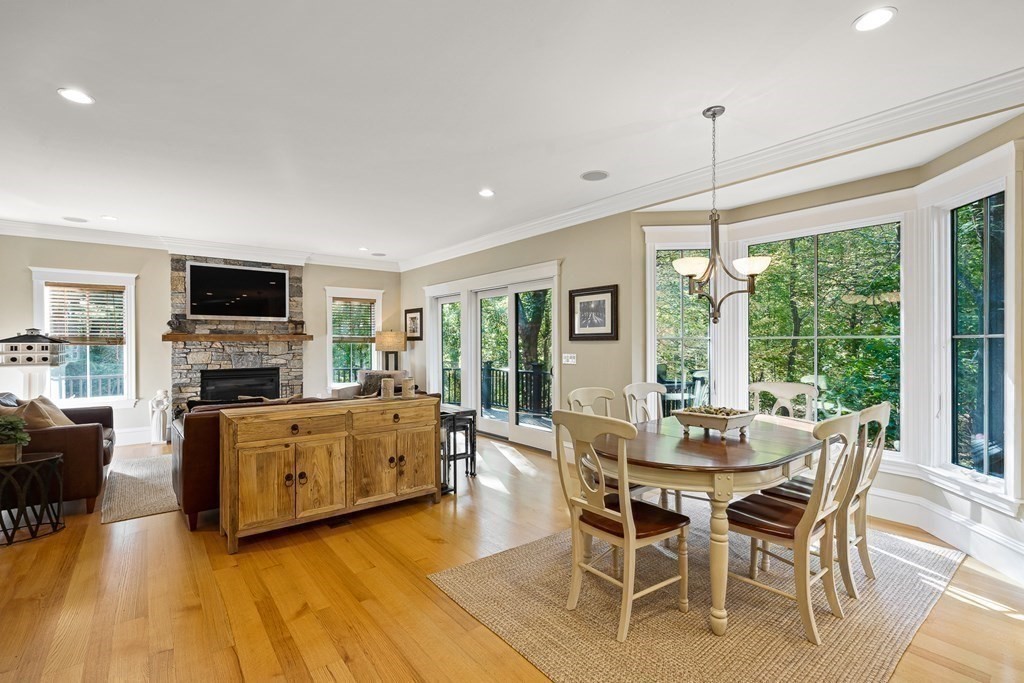 22 McCall Road Winchester, MA 01890 - Photo 12 of 40 a view of a dining room with furniture window and wooden floor