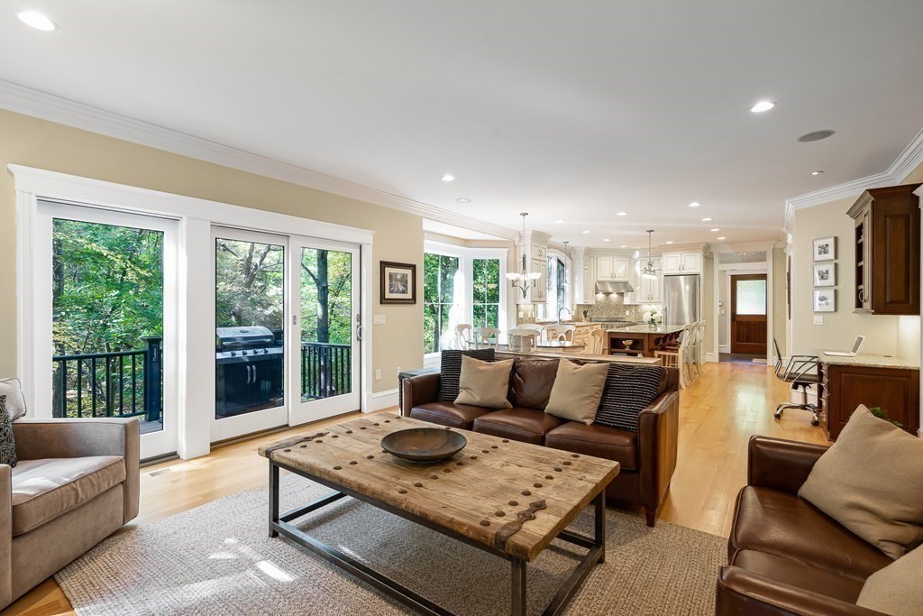 22 McCall Road Winchester, MA 01890 - Photo 15 of 40 a living room with furniture and a large window