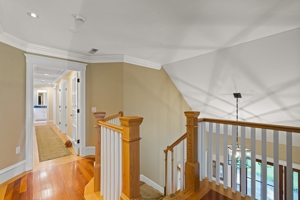 22 McCall Road Winchester, MA 01890 - Photo 20 of 40 a view of a hallway view with staircase