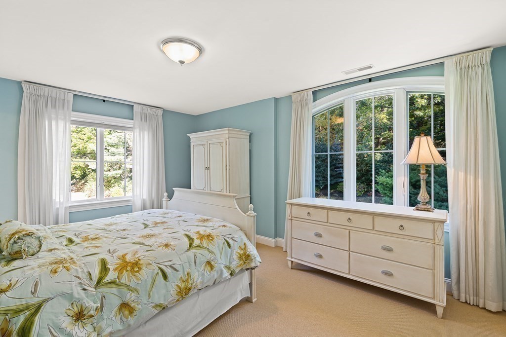 22 McCall Road Winchester, MA 01890 - Photo 26 of 40 a bedroom with a bed and a window
